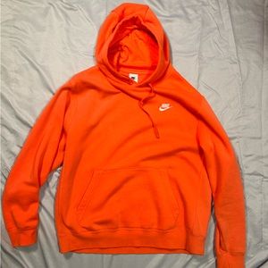 Boys large orange Nike brand new hoodie. Great condition.
